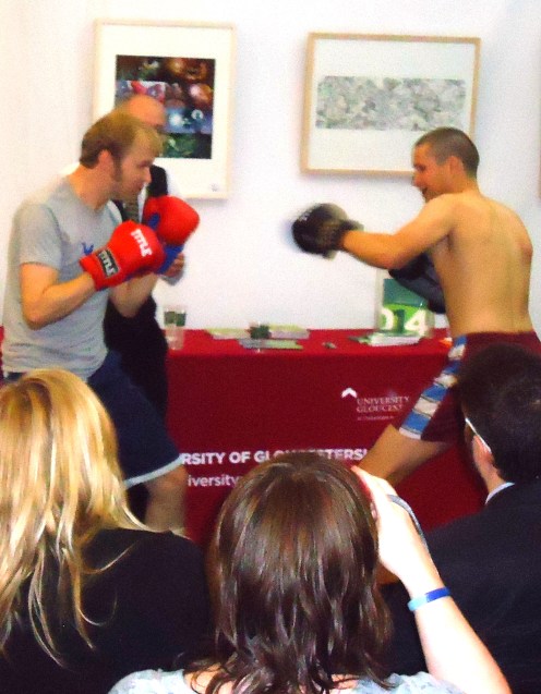 Keevil V Johnston: authors in charity boxing match at the Cheltenham Literature Festival, 2013, refereed by Martin Randall.